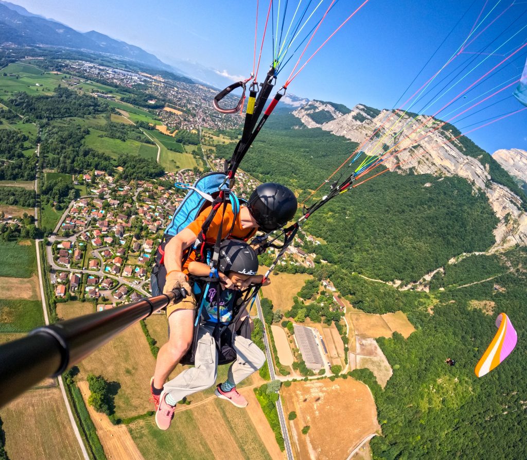 Children's tandem paragliding flight at Saint-Hilaire-du-Touvet, French Alps